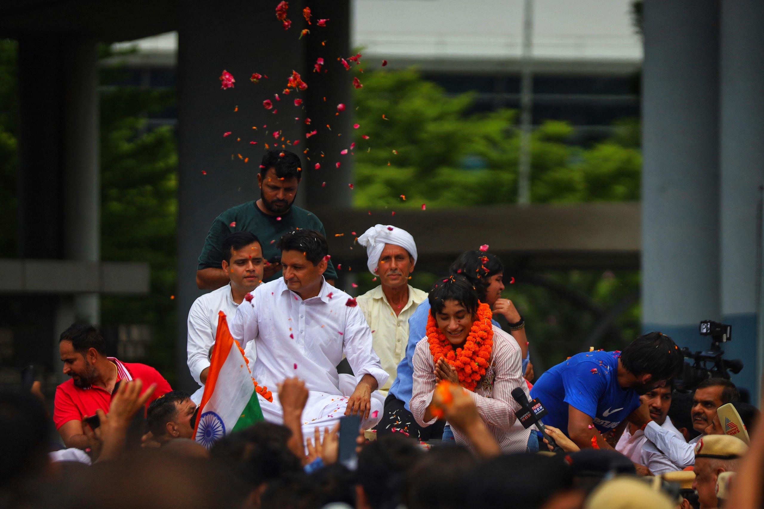 Vinesh leaves the airport with people around her | Photo: Manisha Mondal | ThePrint