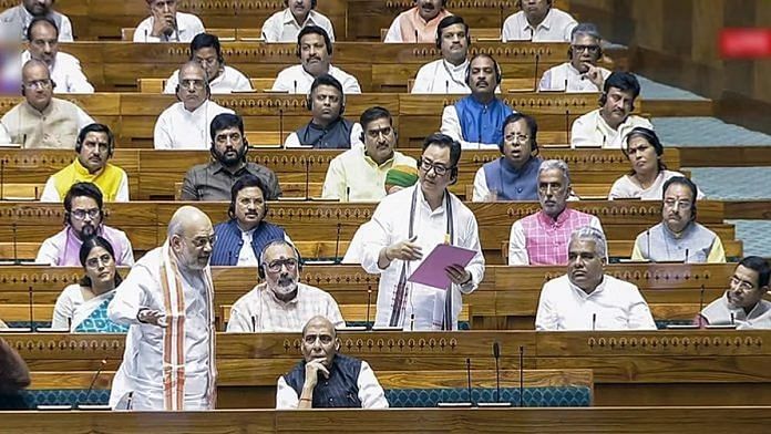 File photo of Union Home Minister Amit Shah, Minority Affairs Minister Kiren Rijiju among others in Lok Sabha during the Monsoon Session of Parliament | ANI/SansadTV