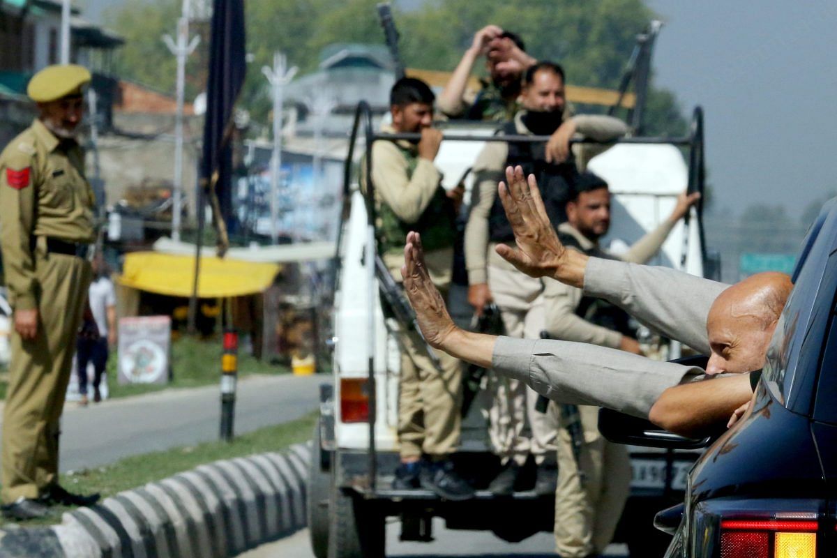 Baramulla MP Engineer Rashid waving to a crowd near Srinagar Airport | Praveen Jain | ThePrint