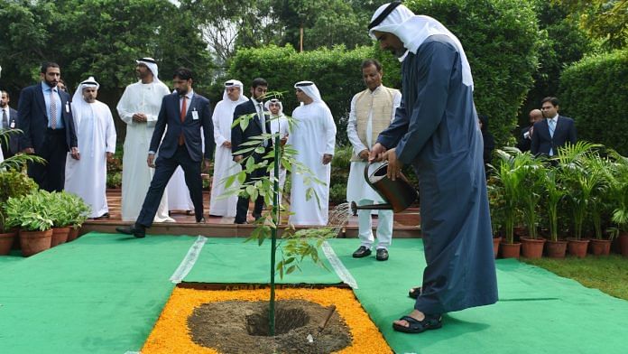 Abu Dhabi Crown Prince Sheikh Khaled bin Mohamed bin Zayed Al Nahyan plants an amaltas sapling at Rajghat Monday | By special arrangement