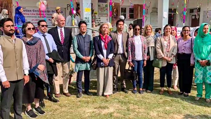 Foreign diplomats observe voting at a polling station during the second phase of Jammu and Kashmir assembly elections in Budgam on Wednesday | PTI Photo