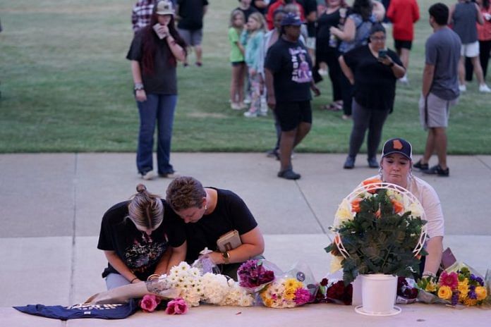 People attend a vigil at Jug Tavern Park following a shooting at Apalachee High School in Winder, Georgia | File Photo | Reuters | Elijah Nouvelage