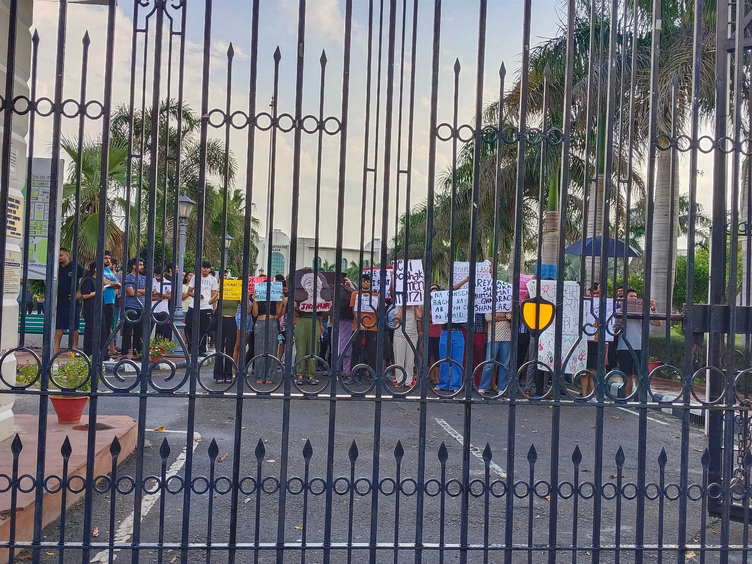 Students interact with media from inside the campus as media access to the campus has been restricted | Photo: Almina Khatoon