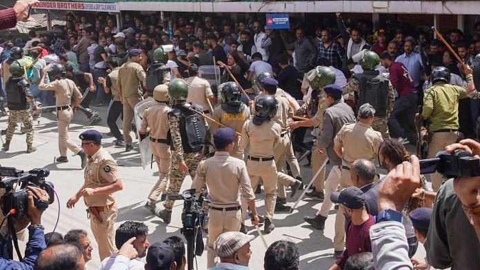 Police and security personnel lathicharge to disperse the protestors, who had gathered on the call of Hindu groups, demanding the demolition of an illegal structure in a mosque, at Sanjauli locality in Shimla, Wednesday, Sept 11, 2024 | PTI