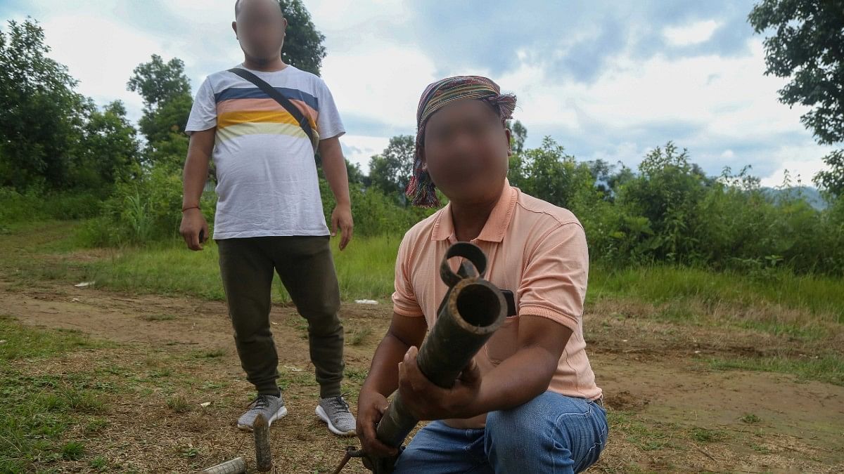 A Kuki village defence force volunteer holding a pumpi gun | Suraj Singh Bisht | ThePrint