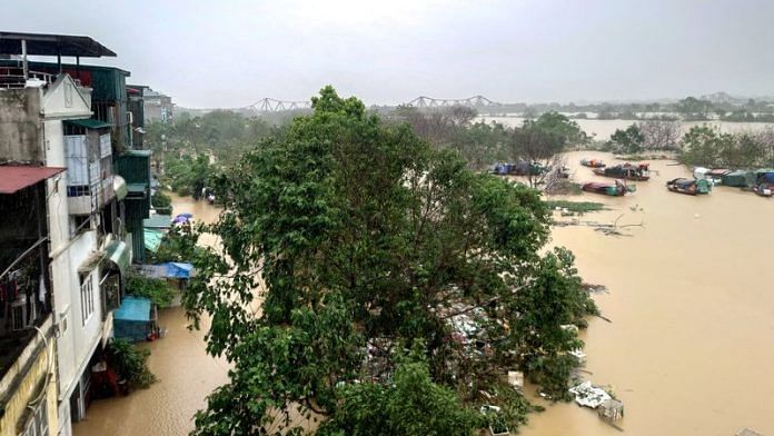 A generic view of a flooded street following the impact of Typhoon Yagi, in Hanoi, Vietnam, September 11, 2024. REUTERS/Khanh Vu