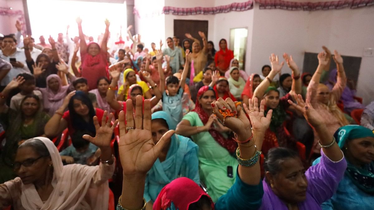 Supporters of Savitri Jindal during a campaign event | Manisha Mondal | ThePrint