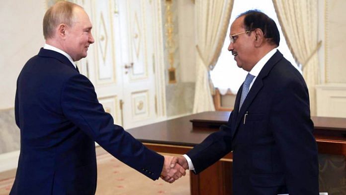 Russian President Vladimir Putin exchanges greetings with National Security Advisor (NSA) Ajit Doval during a meeting, at the Konstantinovsky Palace, in Saint Petersburg on Thursday., 12 September | ANI