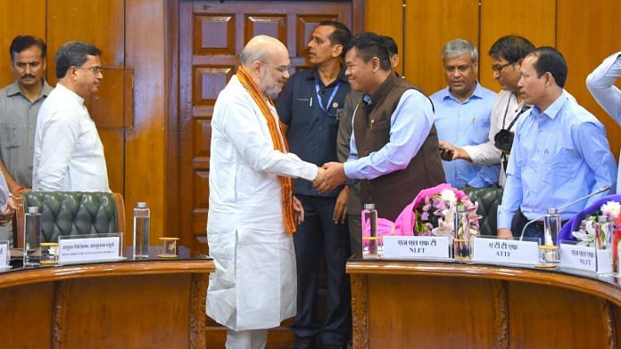 Union Home Minister Amit Shah at signing of peace deal with leaders of NLFT and ATTF in New Delhi, Wednesday | X @AmitShah