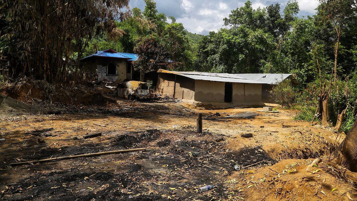 The scorched grass of the area where one of the bombs fell | Suraj Singh Bisht | ThePrint 