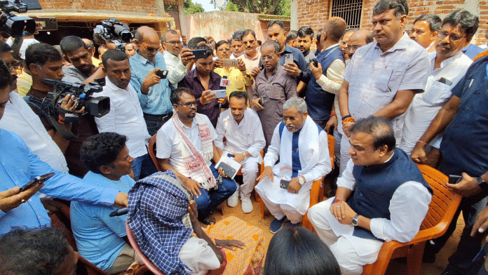 Assam CM and Jharkhand co-election in-charge Himanta Biswa Sarma (sitting extreme right) meeting the family of a youth who died after taking part in marathon in the hope of becoming excise constable | Niraj Sinha | ThePrint