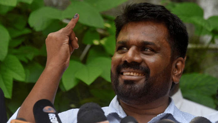 Anura Kumara Dissanayake shows his marked finger after casting his vote in the presidential polls | Reuters