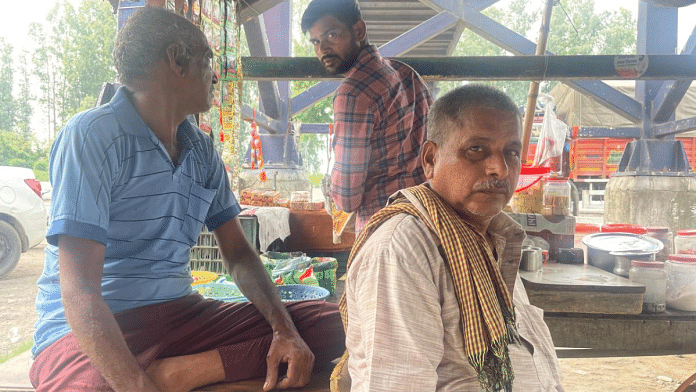 Farmer Ratilal Kewat with fellow villagers at tea shop in Kurukshetra's Ladwa constituency. CM Nayab Saini is contesting from this assembly segment | Shanker Arnimesh | ThePrint