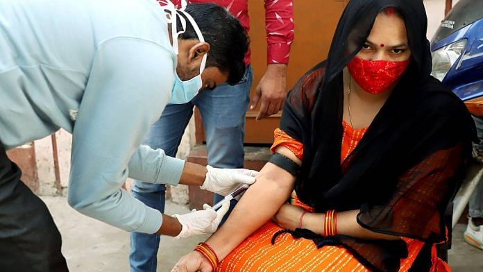 A healthcare worker collects a blood sample from a woman for Zika virus testing in Lucknow | ANI