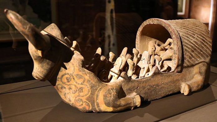 Terracotta boat in the shape of a bull and female figurines. India's pottery traditions go all the way back to the pre-Harappan Kot Diji period.