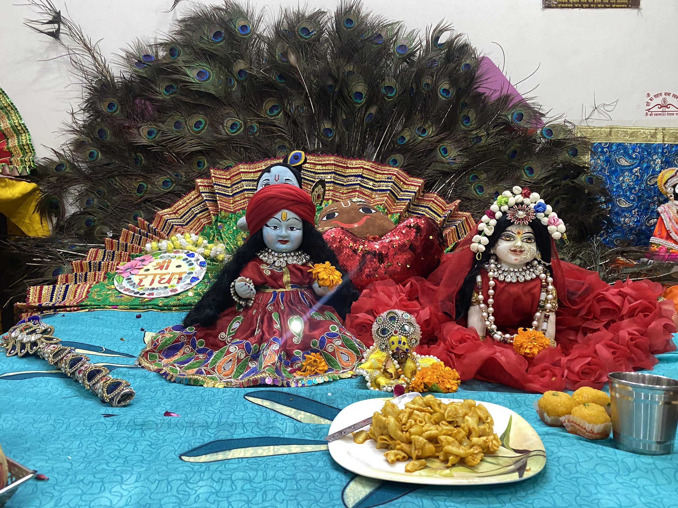 Idols of Krishna and Radha in Arora's puja room