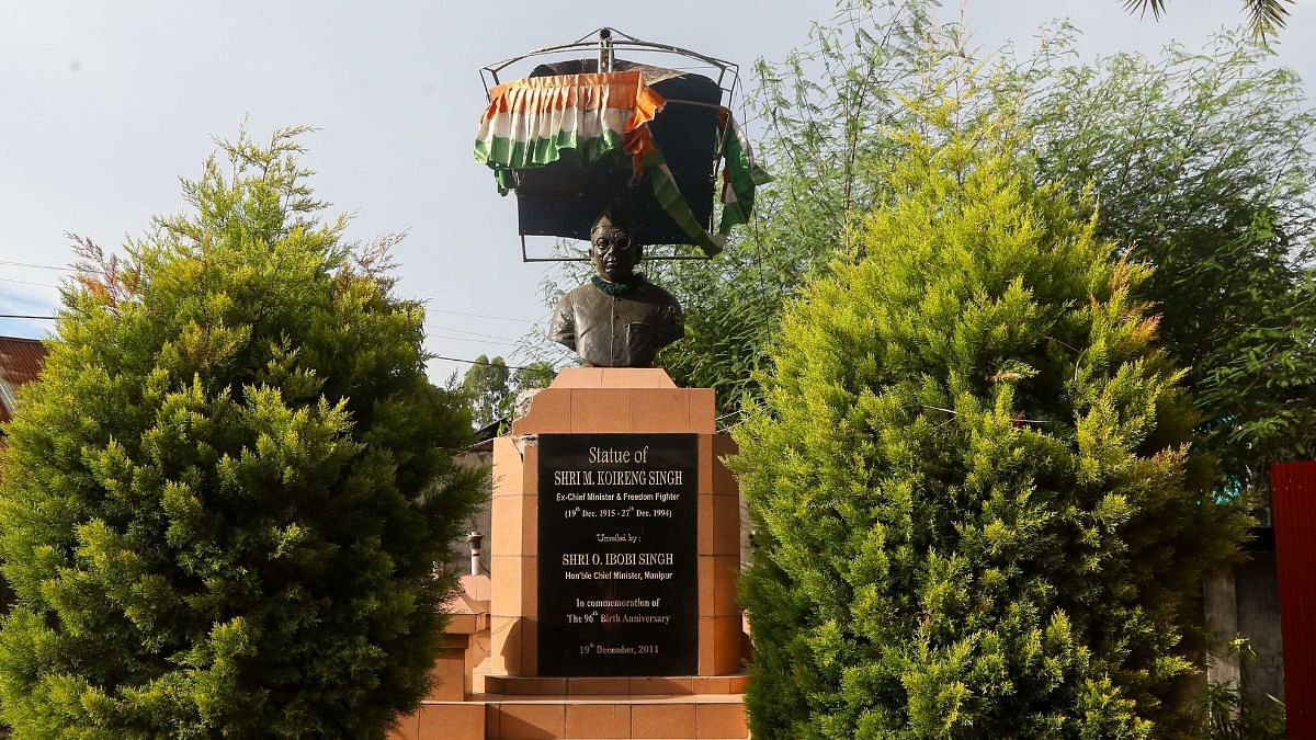 A stone bust of late CM Mairembam Koireng Singh in the compound of his house | Suraj Singh Bisht | ThePrint