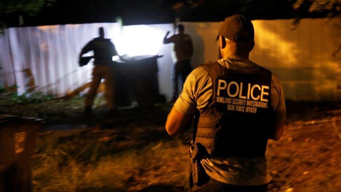 Secret Service and Homeland Security agents check a former home of a suspect named by news organizations as Ryan W. Routh as the FBI investigates what they said was an apparent assassination attempt in Florida on Republican presidential nominee and former U.S. President Donald Trump, in Greensboro, North Carolina, U.S. September 15, 2024. REUTERS/Jonathan Drake