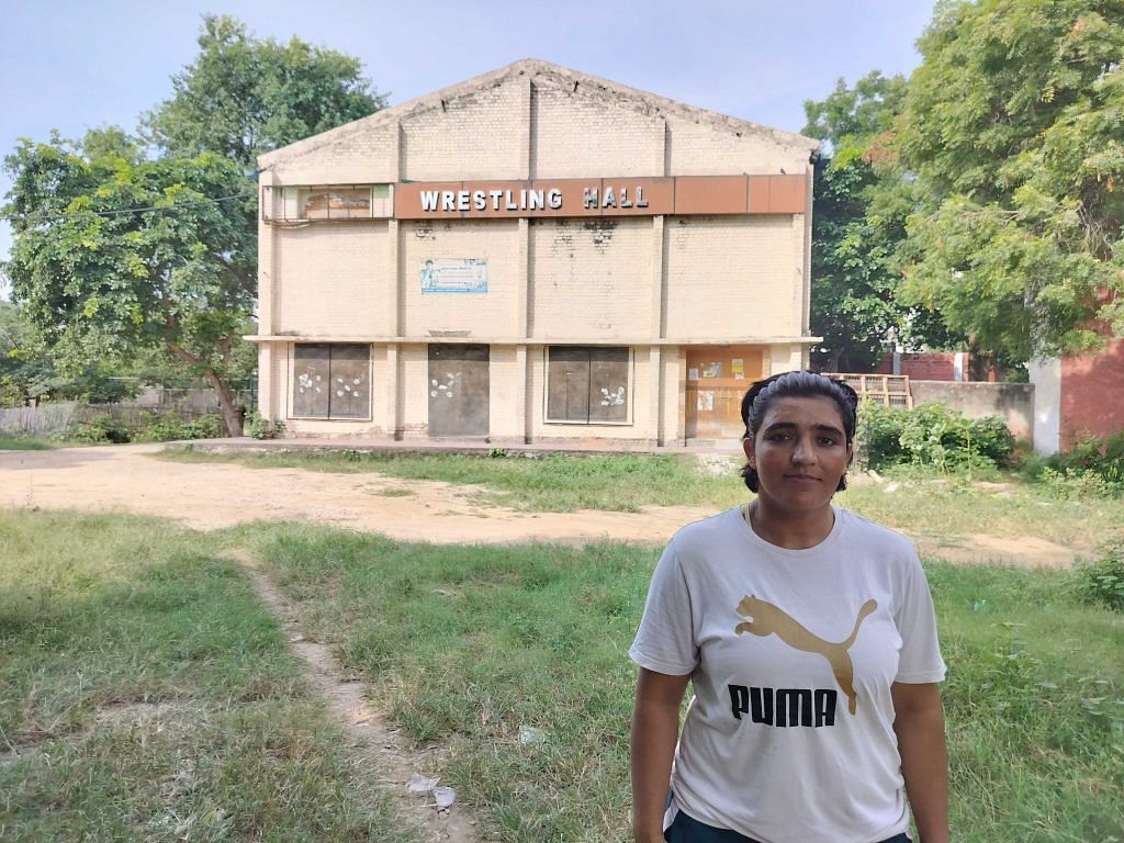 Pinki Malik at Chotu Ram stadium in Rohtak where she trained. She now works as a ticket checker. | Shubhangi Misra | ThePrint 