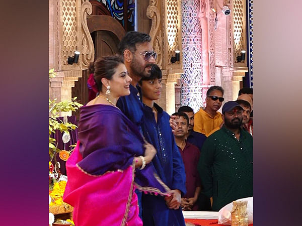 Ajay Devgn offers prayers at Dugra Puja pandal with wife Kajol, son Yug 