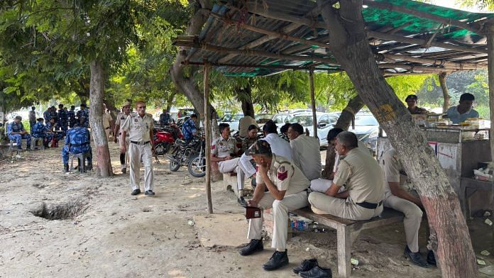 Rapid Action Force and police personnel outside Bawana police station | Bismee Taskin | ThePrint