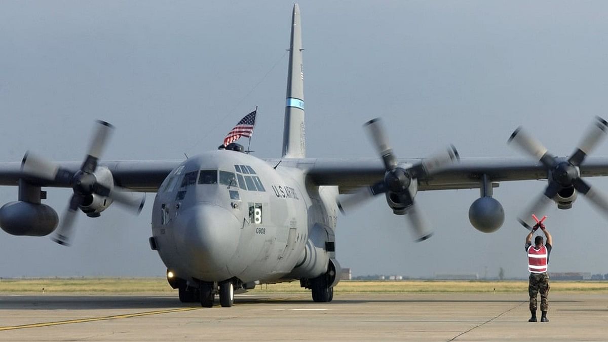 US C-130 en route to India with radar antenna reflector