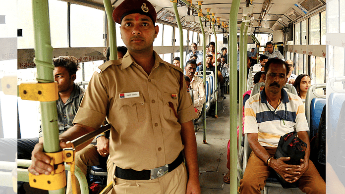 A marshal stands in a DTC bus in New Delhi | File Photo | ANI