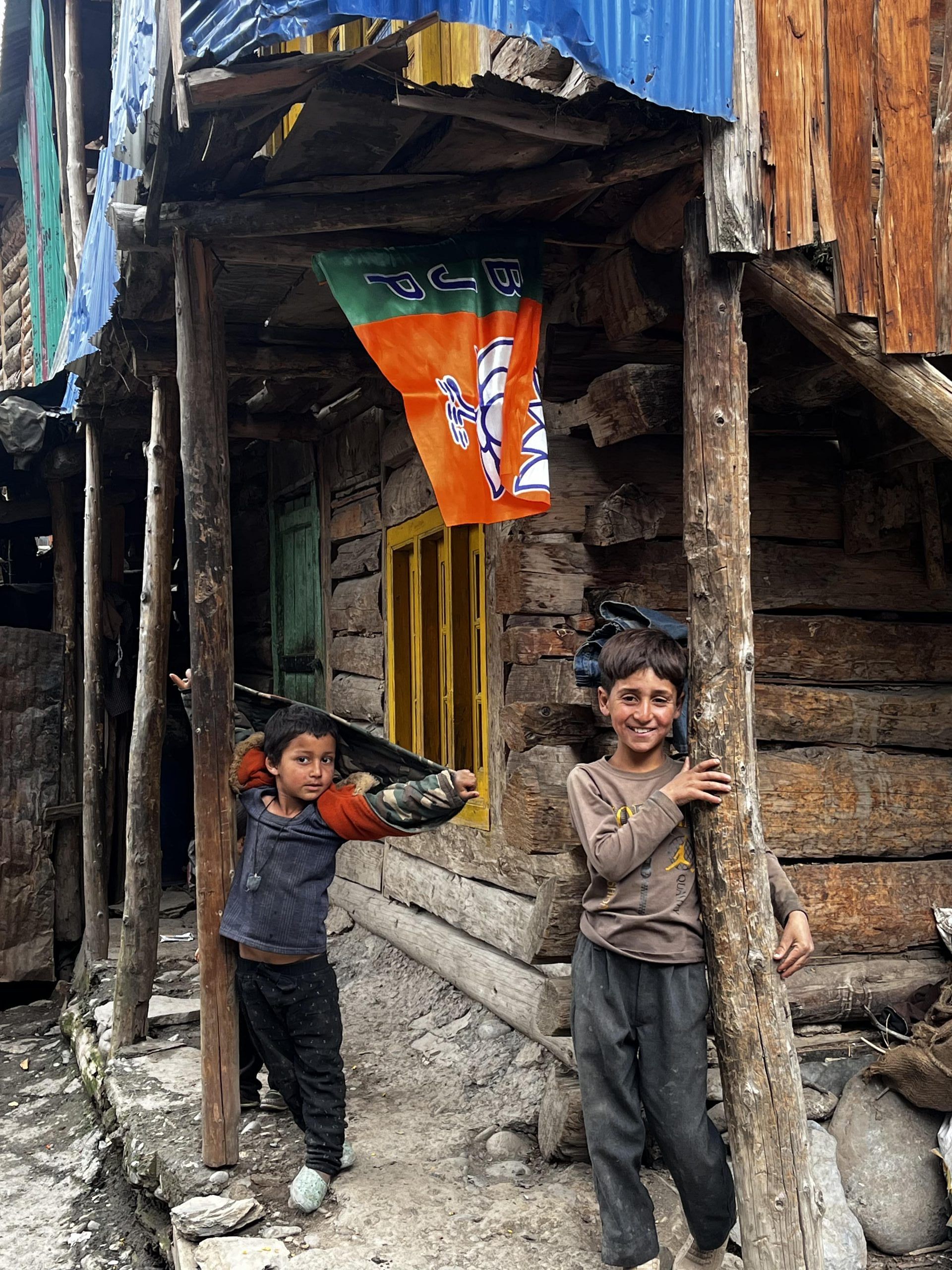 A BJP flag hangs in a traditional wooden home in Purani Tulail. | Praveen Swami | ThePrint 