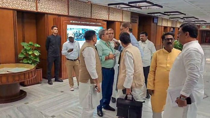 An injured Kalyan Banerjee with other MPs after he smashed a glass bottle at a JPC meeting, in New Delhi, Tuesday. | ANI