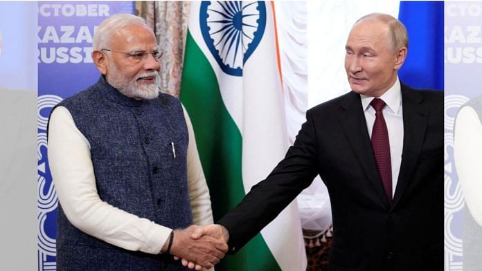 Russian President Vladimir Putin shakes hands with Indian Prime Minister Narendra Modi during their meeting on the sidelines of the BRICS Summit in Kazan, Russia, on 22 October, 2024 | Photo: Alexander Zemlianichenko/Pool via REUTERS