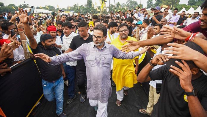 Prashant Kishor with supporters during the formal launch of Jan Suraaj Party at Veterinary College grounds in Patna Wednesday | PTI Photo