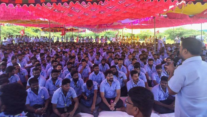 Workers of a Samsung facility listen to a speaker during a strike to demand higher wages at its Sriperumbudur plant near Chennai, on 10 September. | Reuters