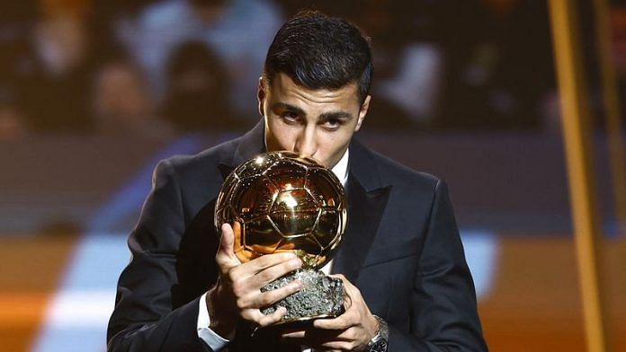 Spain's and Manchester City's Rodri with the Ballon d'Or REUTERS/Sarah Meyssonnier