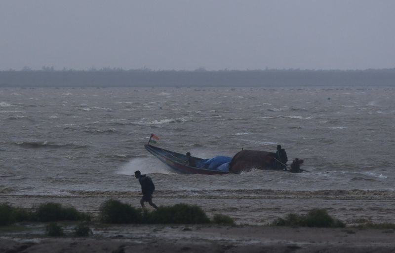Trees uprooted, power lines snapped as Cyclone Dana pummels India's