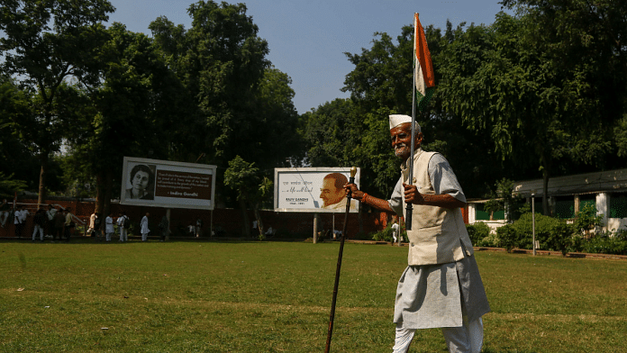 A Congress supporter at the party headquarters in New Delhi on Tuesday | Suraj Singh Bisht | ThePrint