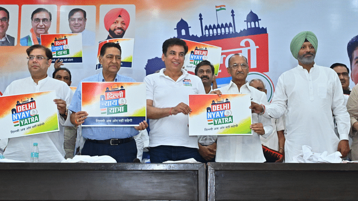 Delhi Pradesh Congress Committee chief Devendra Yadav (centre) releases campaign material of Nyay Yatra | X/@INCDelhi