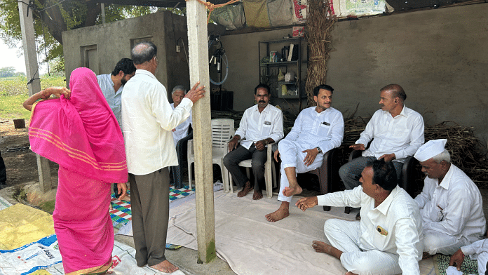 NCP (Sharadchandra Pawar) candidate Yugendra Pawar (seated centre on chair) meets villagers from Mekhali in Baramati taluka | Manasi Phadke | ThePrint