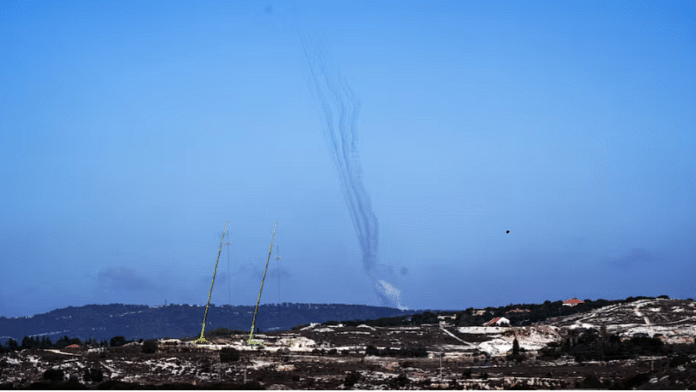 Rockets are launched from Lebanon towards Israel, amid cross-border hostilities between Hezbollah and Israel, as seen from northern Israel, 8 October 2024 | Reuters | Ayal Margolin