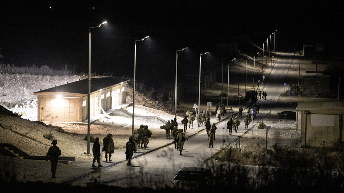 Israeli soldiers walk near the scene where a drone from Lebanon attacked Israel, amid cross-border hostilities between Hezbollah and Israel, in Binyamina Israel. Lebanon's Hezbollah claimed responsibility for the attack | File Photo | Reuters | Itay Cohen