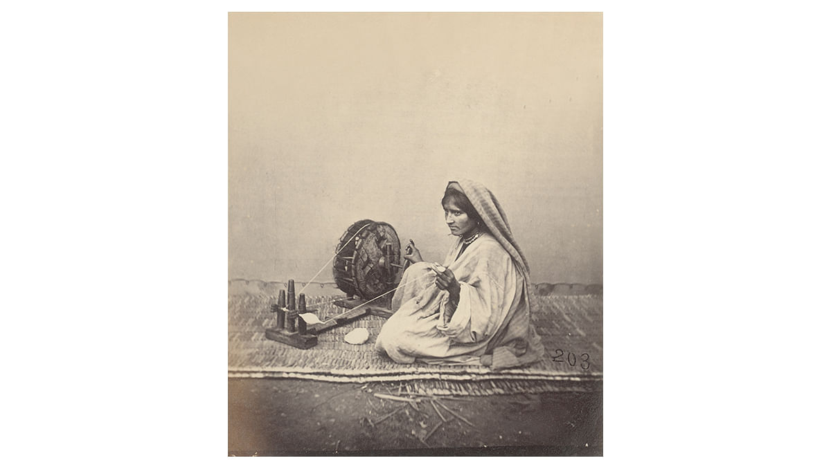 Woman with a spinning wheel in British India, c. 1870, Silver gelatin print. Image courtesy of Leiden University Libraries, Netherlands