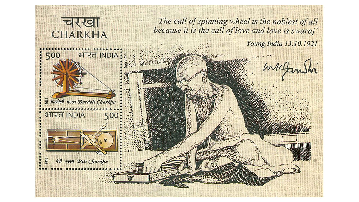 Postal stamp with illustration of Mahatma Gandhi with a charkha, India Post, 2015, Offset lithography and hot stamping. Image courtesy of Wikimedia Commons