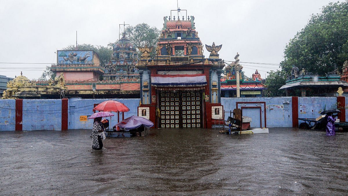 A temple partially submerged in flood water after heavy rainfall in Chennai on 15 October | Photo: ANI