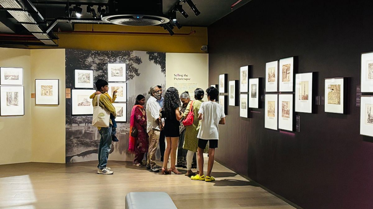 Swapna Liddle with attendees at a Delhi art gallery | Photo: Vandana Menon, ThePrint