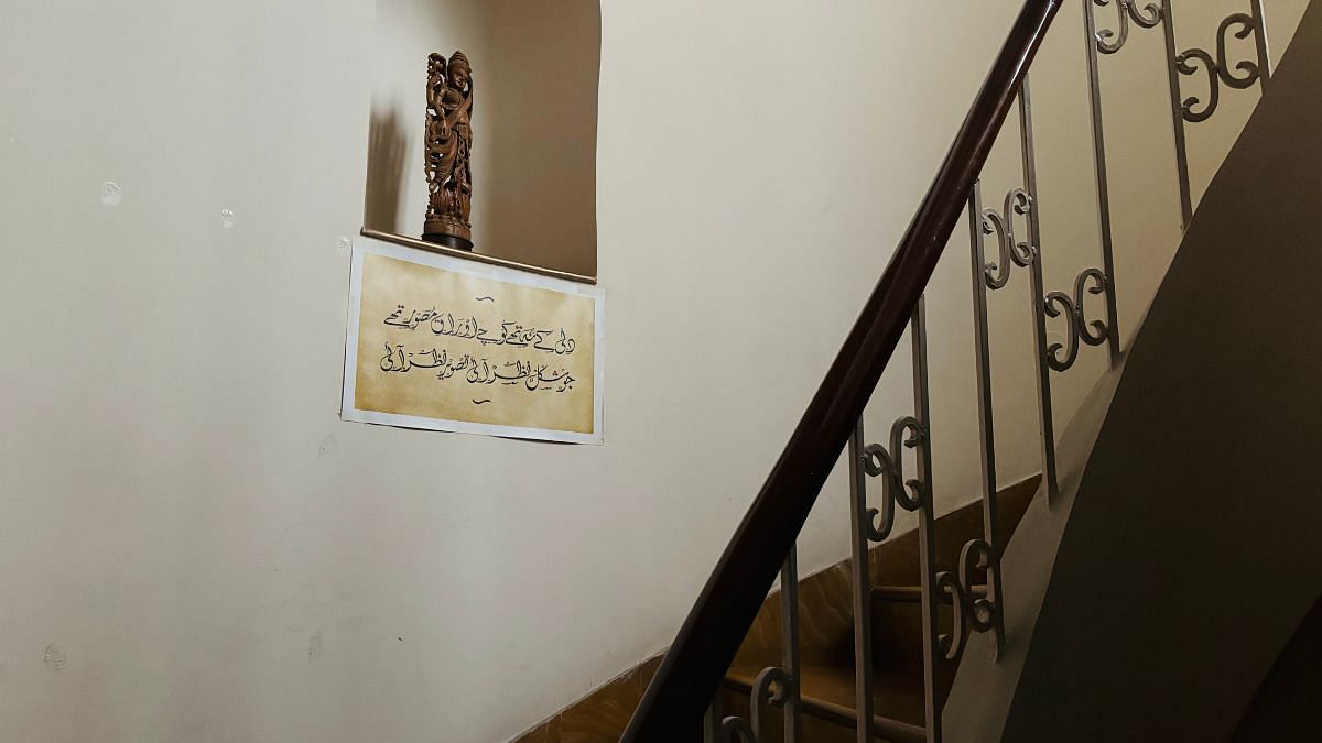 An Urdu couplet by poet Mir Taqi Mir in Swapna Liddle's home | Photo: Vandana Menon, ThePrint