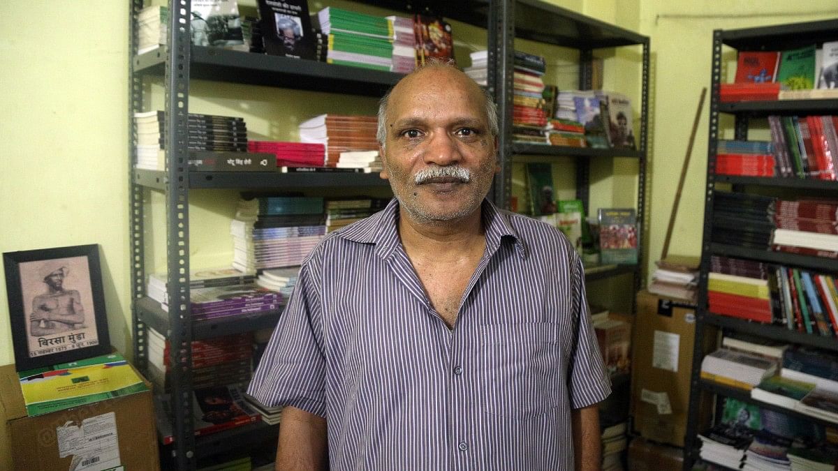 Writer A. K. Pankaj, who researches indigenous history and human rights, at his home-cum-publishing house in Ranchi | Suraj Singh Bisht | ThePrint