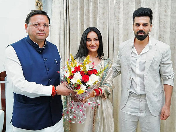 Newlyweds Surbhi Jyoti-Sumit Suri meet Uttarakhand CM Pushkar Singh Dhami