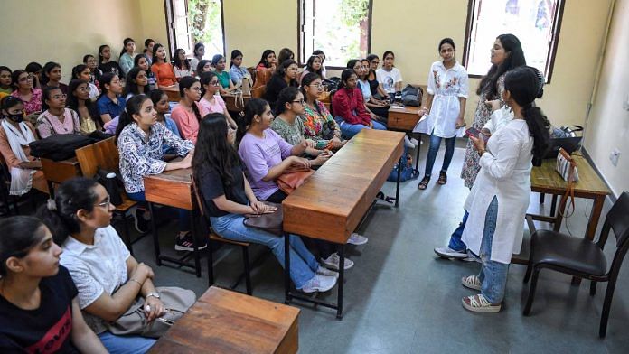 Senior students at a Delhi University college interact with freshers during an orientation programme | Photo: ANI
