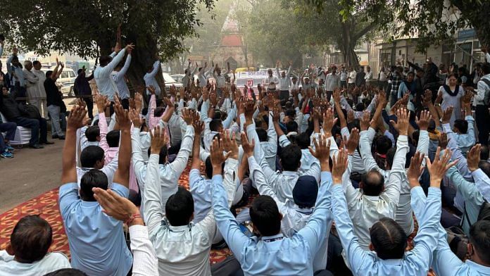 Delhi Transport Corporation employees protest in front of the DTC headquarters in New Delhi Wednesday | Photo: Vartika Singh/ThePrint