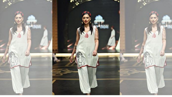 A model walks the Ramp in a Mohsin Sayeed kurta embroidered with Arundhati Roy’s face | Photo: By special arrangement