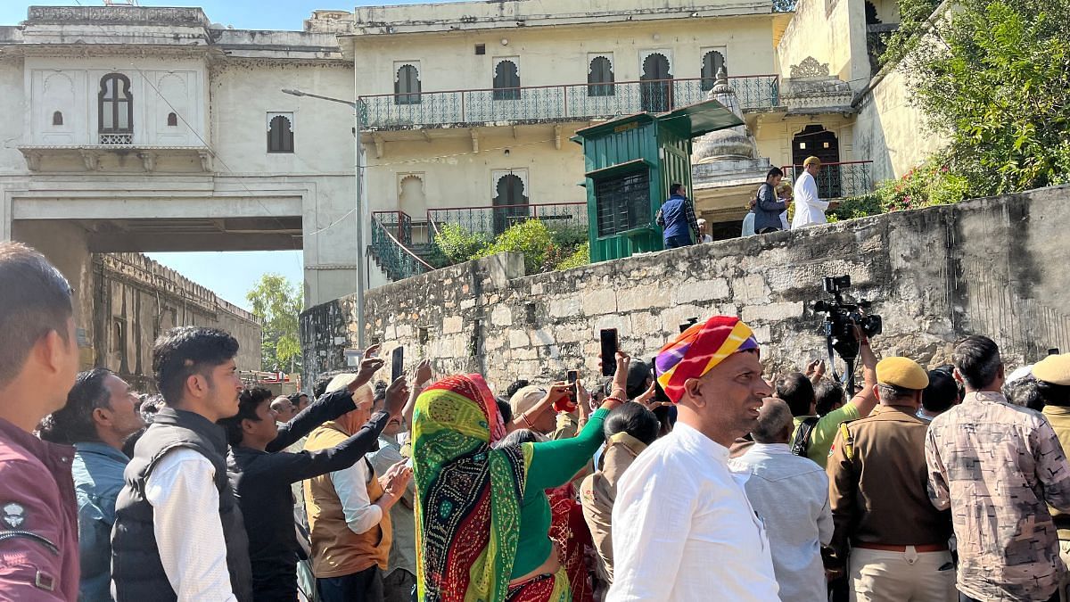 People try to catch a glimpse of Vishvaraj Singh outside the Eklingji temple. | Antara Baruah | ThePrint